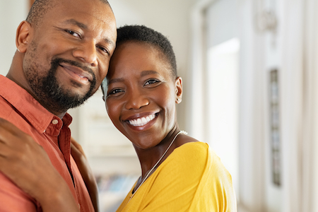 Happy mature couple with tight skin